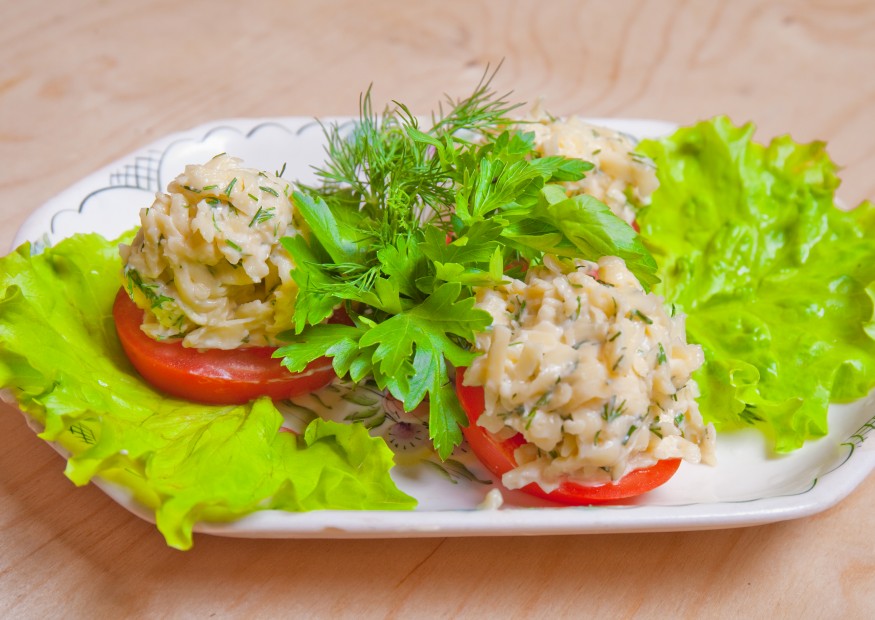 Tomatoes with cheese, garlic and herbs.