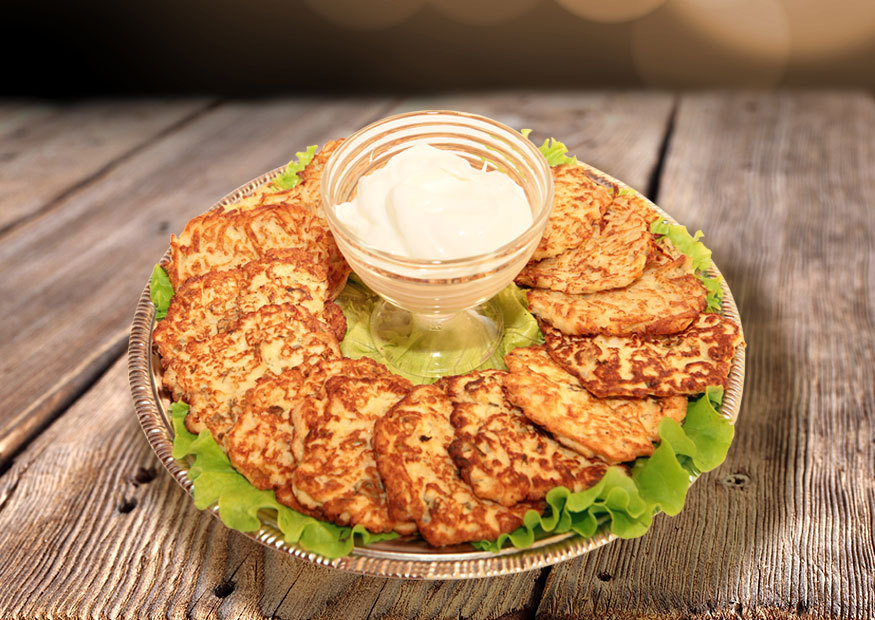 Assorted crispy potato pancakes and tender chicken fritters.