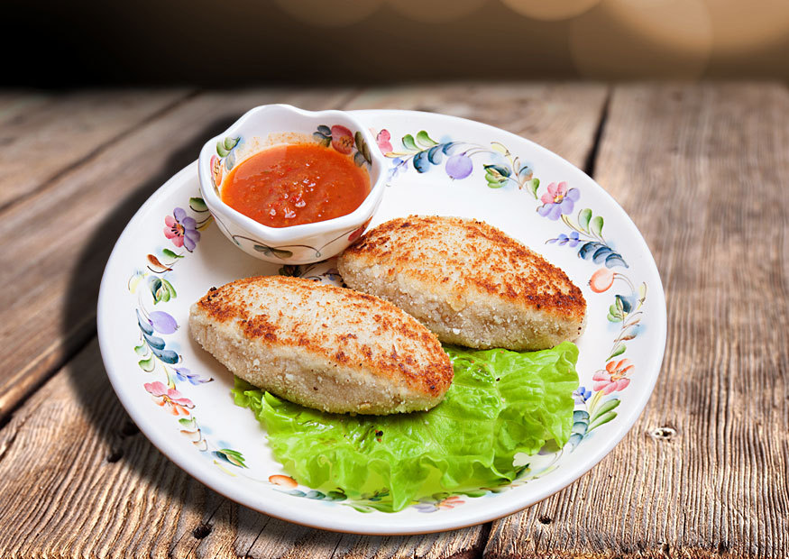 Home-made chicken fillet patties fried in crumbs