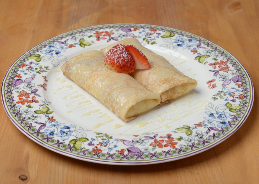 Homemade pancakes with cottage cheese and vanilla sauce