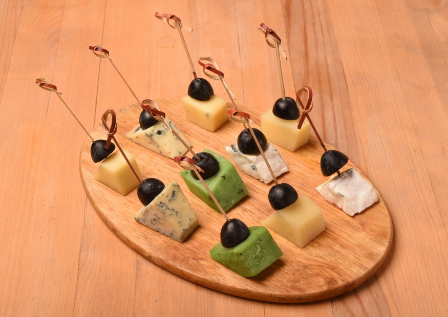 Canapes with cheese and grapes