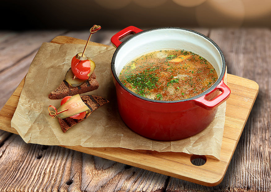 Aromatic ear of salmon and pike perch with croutons of Borodino bread