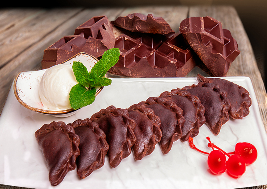 Dumplings with cherry and milk chocolate